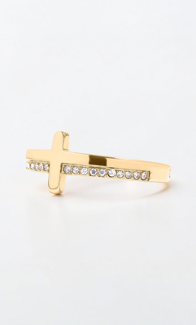 Side view of gold cross ring