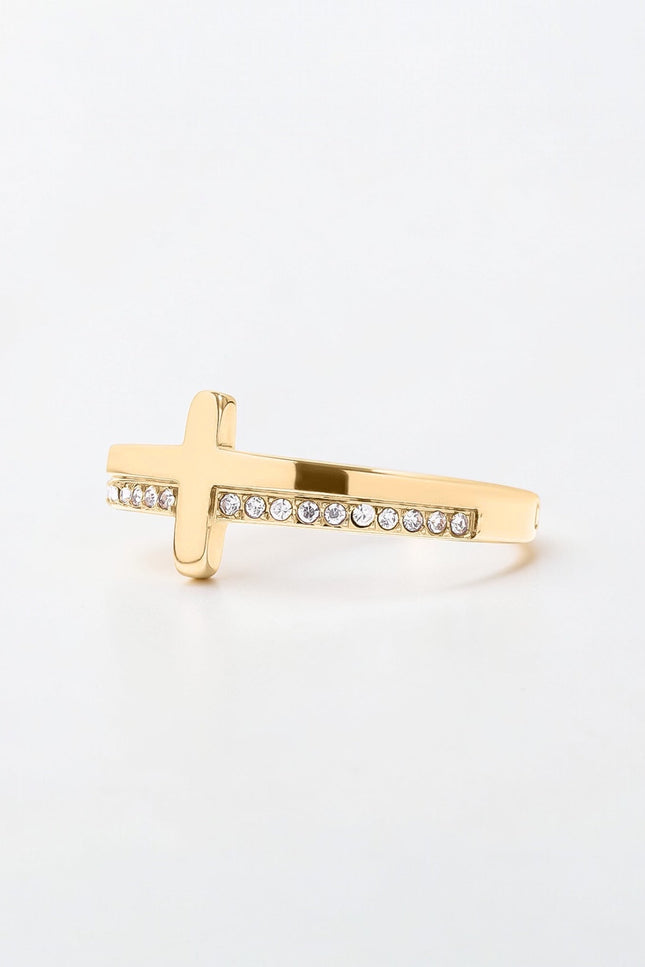 Side view of gold cross ring