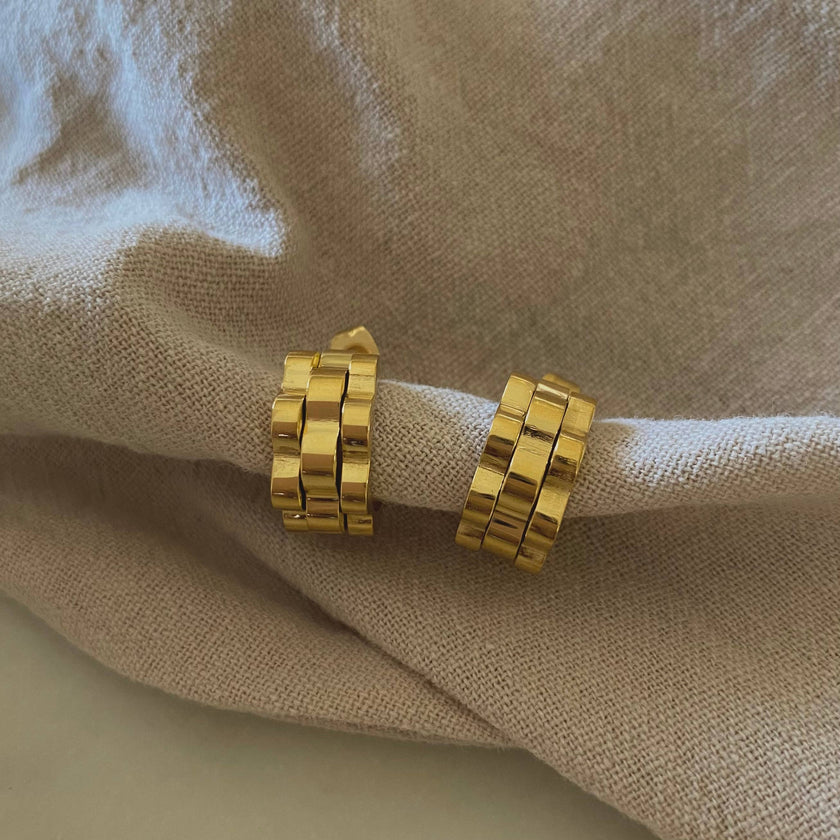 18k gold-plated stainless steel watchband-texture hoop earrings — waterproof and hypoallergenic jewelry from Justyna Grace Boutique.