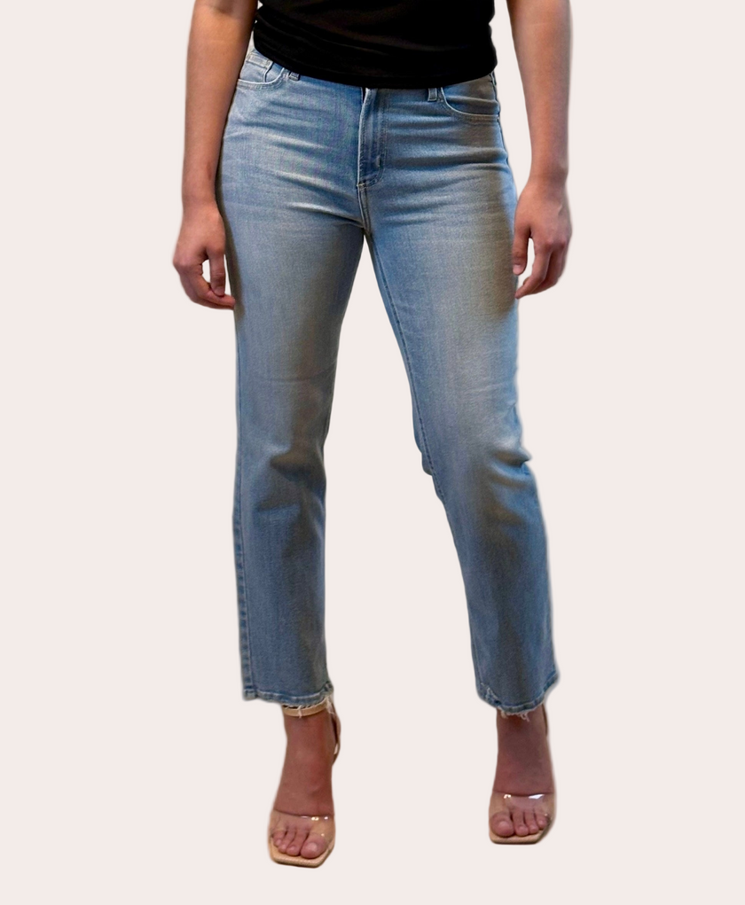 Classic medium-wash straight jeans with subtle stretch — timeless everyday denim from Justyna Grace Boutique.