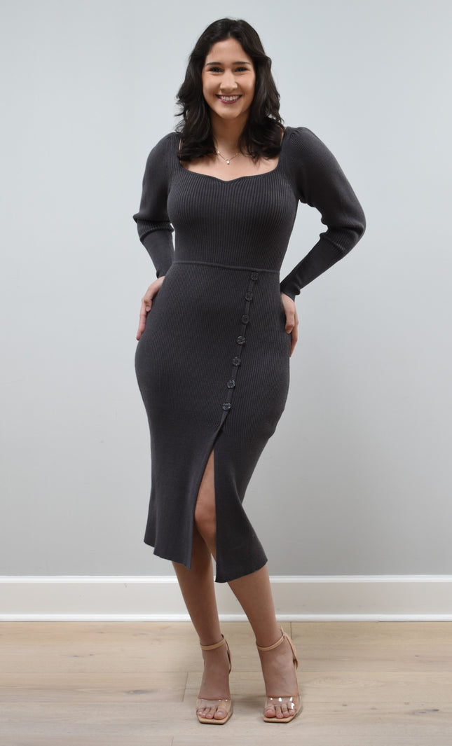 Gracie Rib Knit Midi Dress on soft linen background, featuring long sleeves, ribbed fabric, and button-front detail.
