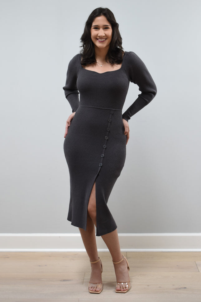 Gracie Rib Knit Midi Dress on soft linen background, featuring long sleeves, ribbed fabric, and button-front detail.
