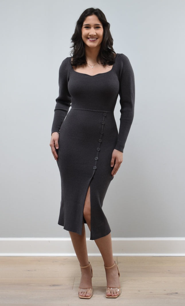 Gracie Rib Knit Midi Dress on soft linen background, featuring long sleeves, ribbed fabric, and button-front detail.