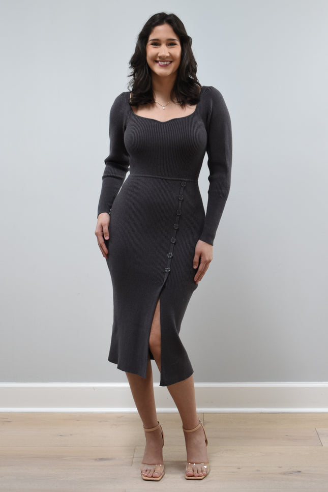 Gracie Rib Knit Midi Dress on soft linen background, featuring long sleeves, ribbed fabric, and button-front detail.