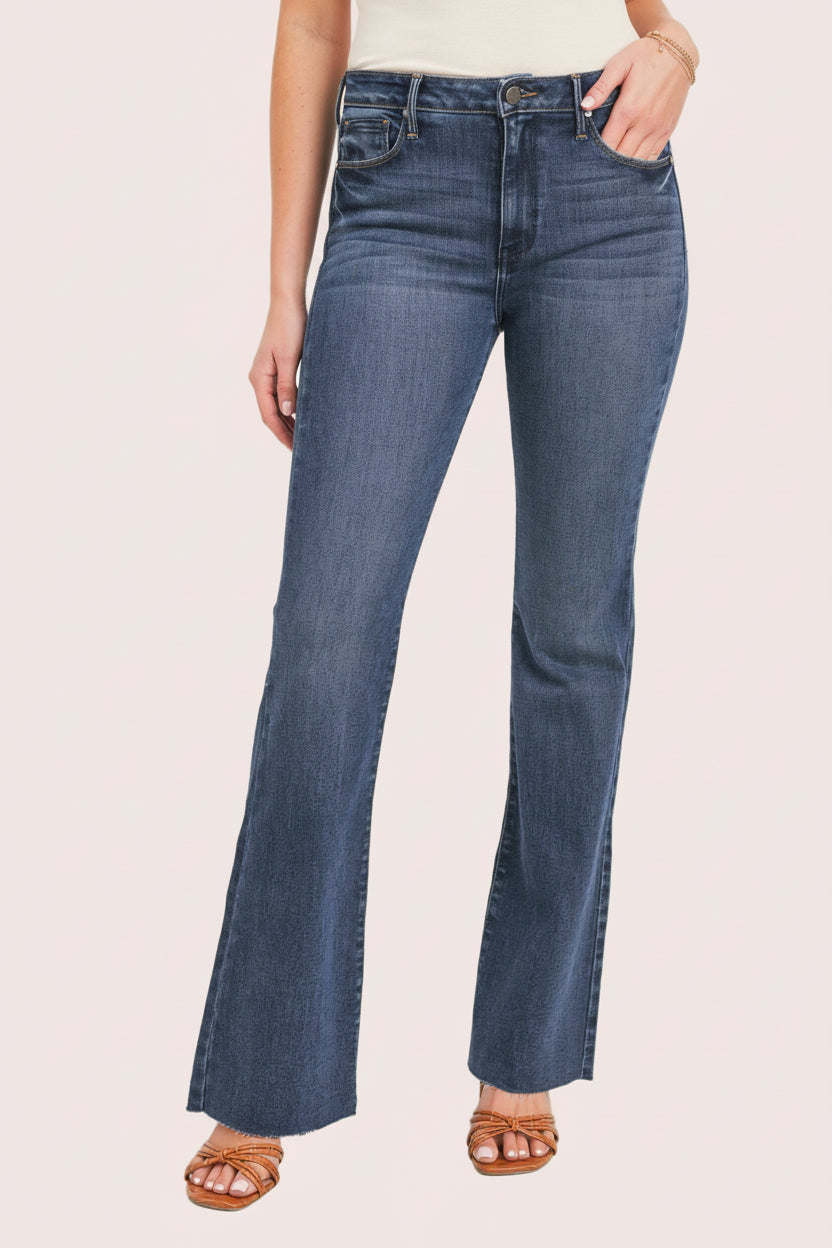 Dark Wash Scissor Hem Flares — high-rise dark denim flares with raw hem from Justyna Grace Boutique.