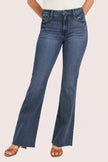 Dark-wash high-rise flare jeans with clean finish — flattering retro silhouette from Justyna Grace Boutique.