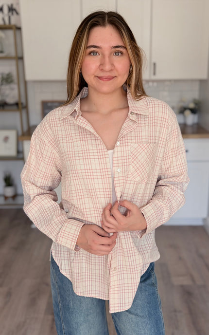 Model wearing Hollis oversized plaid cotton button down shirt layered over tank