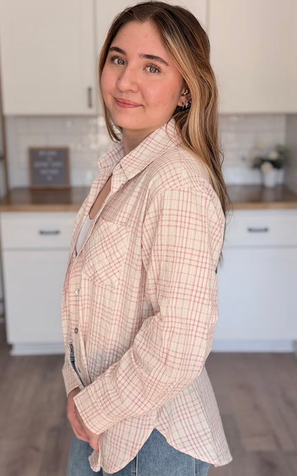 Model wearing Hollis oversized plaid cotton button down shirt layered over tank