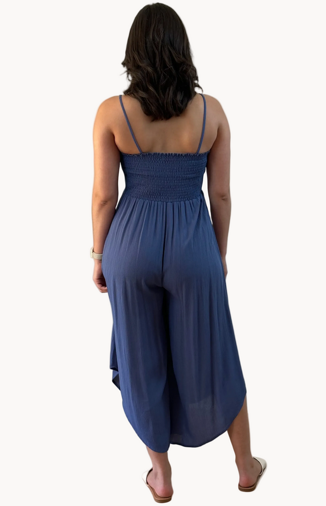 Isla Jumpsuit — woven solid fabric with ruched front and round midi hemline from Justyna Grace Boutique.
