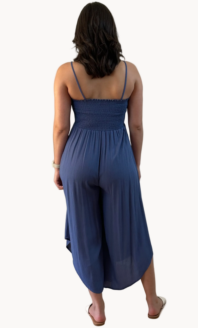 Isla Jumpsuit — woven solid fabric with ruched front and round midi hemline from Justyna Grace Boutique.
