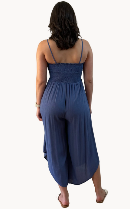Isla Jumpsuit — woven solid fabric with ruched front and round midi hemline from Justyna Grace Boutique.