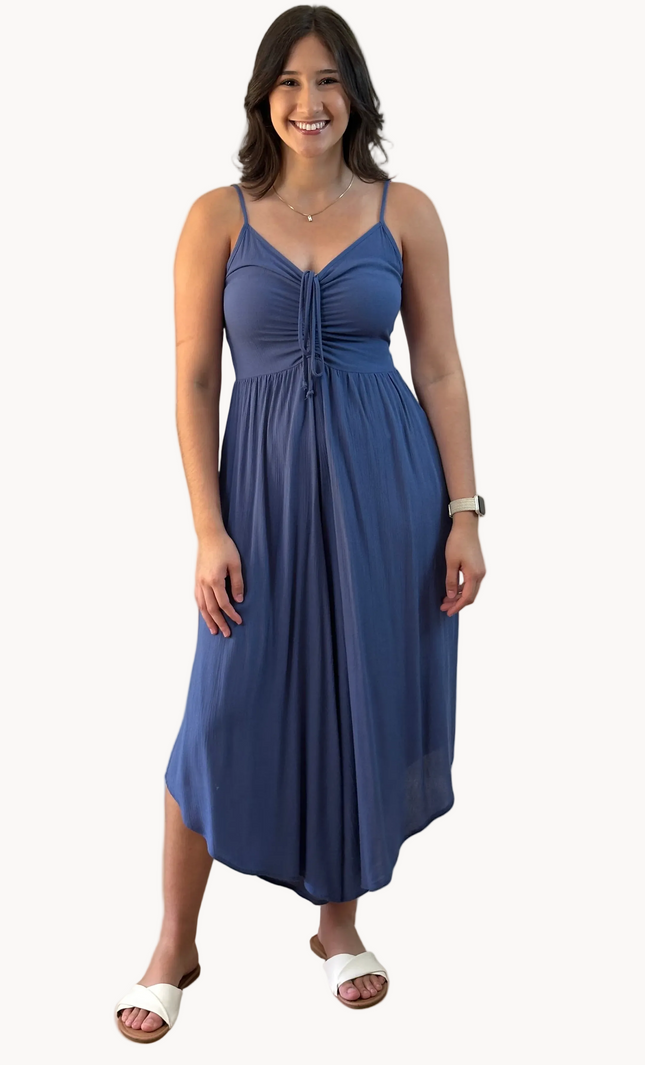 Isla Jumpsuit — woven solid fabric with ruched front and round midi hemline from Justyna Grace Boutique.