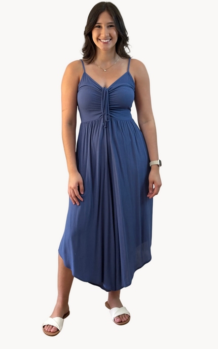 Isla Jumpsuit — woven solid fabric with ruched front and round midi hemline from Justyna Grace Boutique.