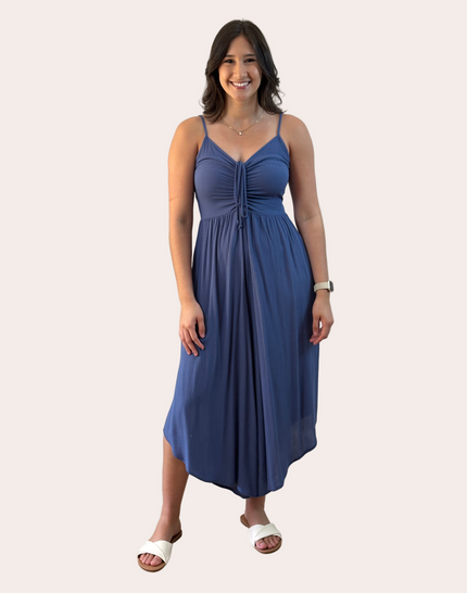 Isla Jumpsuit — woven solid fabric with ruched front and round midi hemline from Justyna Grace Boutique.