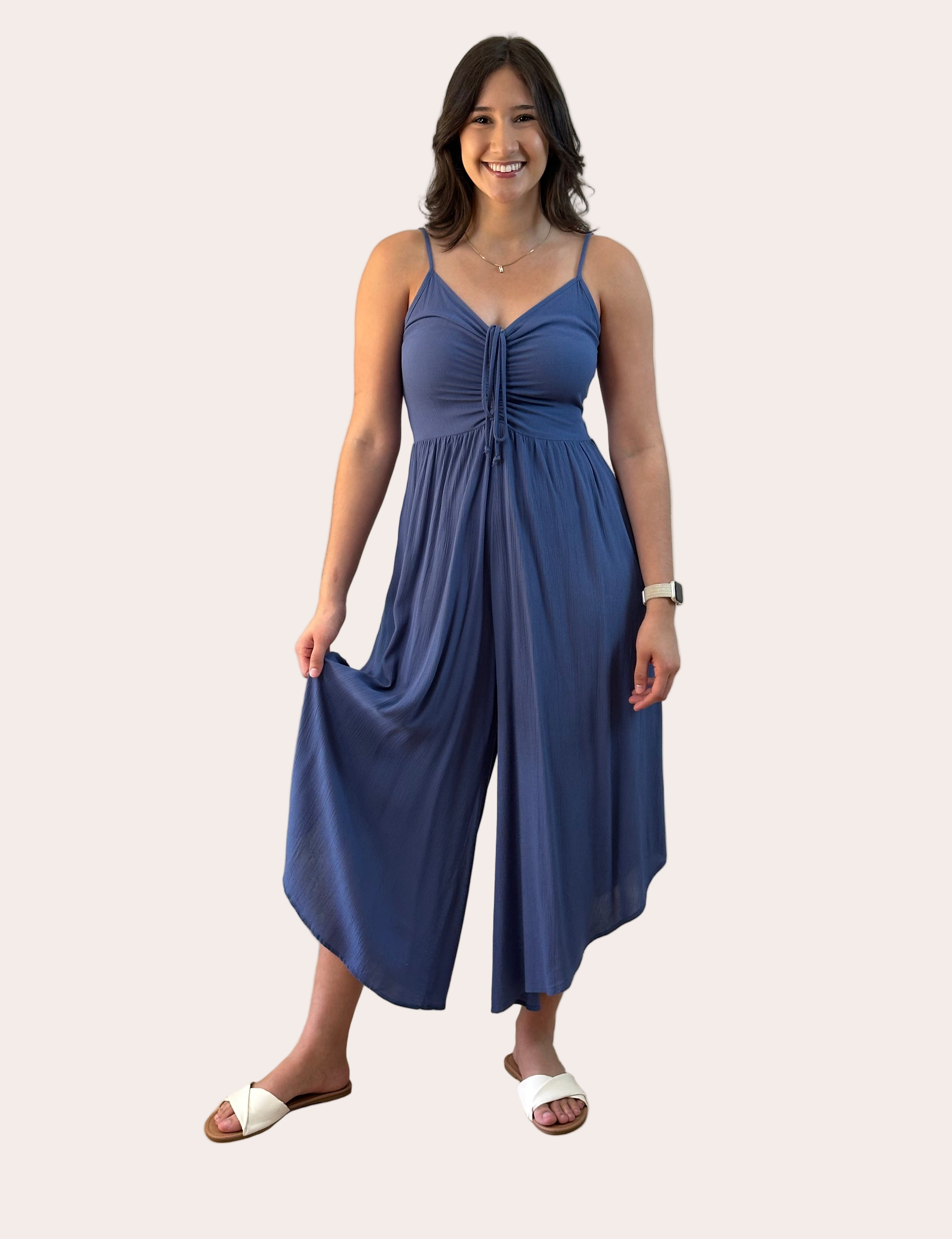 Isla Jumpsuit — woven solid fabric with ruched front and round midi hemline from Justyna Grace Boutique.