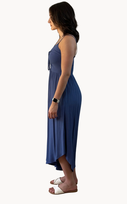 Isla Jumpsuit — woven solid fabric with ruched front and round midi hemline from Justyna Grace Boutique.
