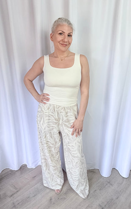 Women's island leaf print straight leg pants with lightweight rayon linen fabric and relaxed fit.