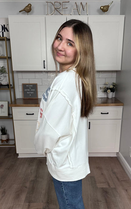 Mineral-washed French terry crew sweatshirt with Jesus Loves You patch and relaxed fit