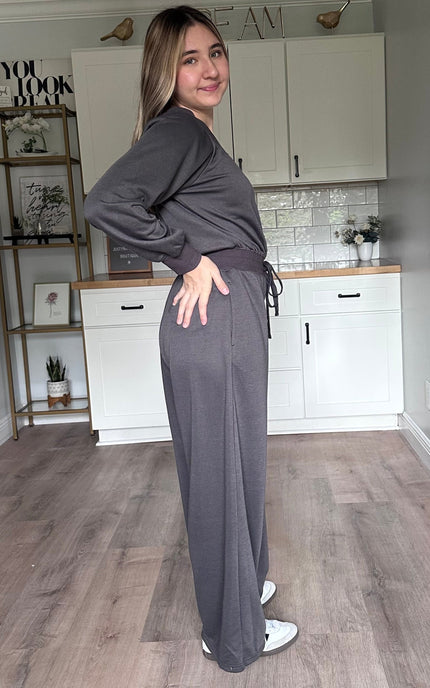 Side view of the Juliet wide-neck jumpsuit showing relaxed silhouette and lightweight knit fabric