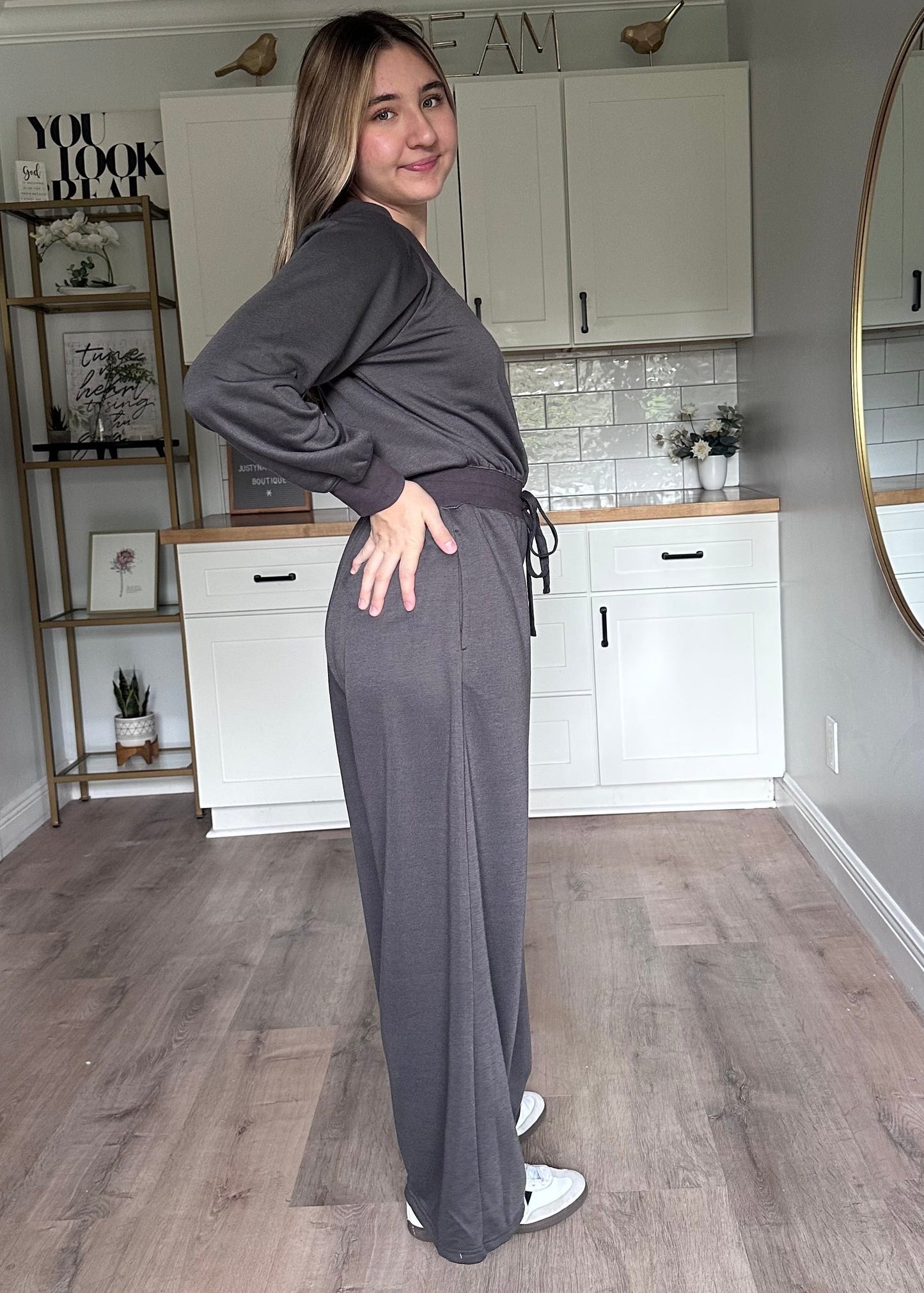 Side view of the Juliet wide-neck jumpsuit showing relaxed silhouette and lightweight knit fabric