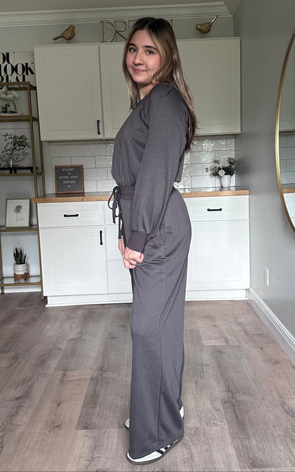 Side view of the Juliet wide-neck jumpsuit showing relaxed silhouette and lightweight knit fabric