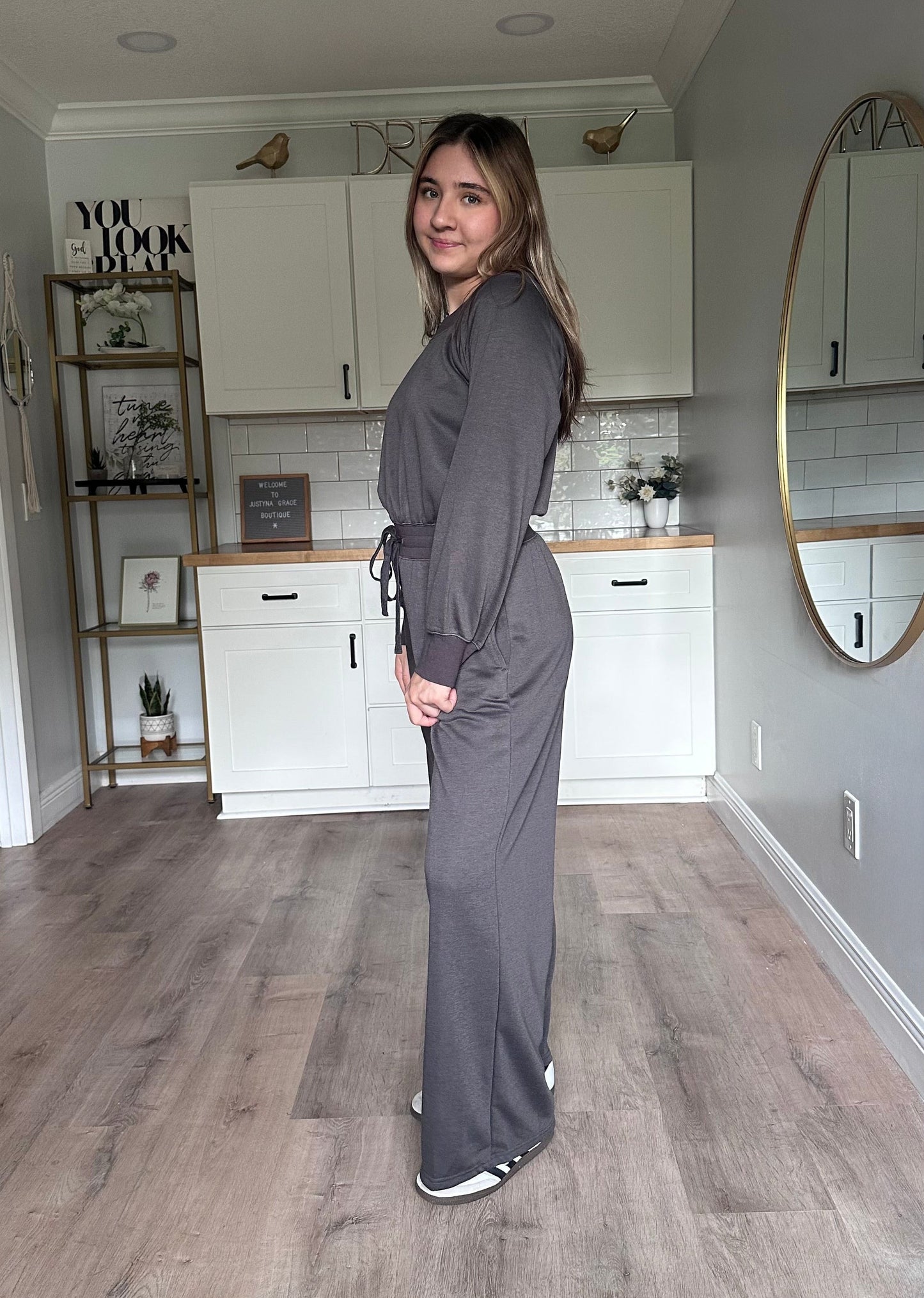 Side view of the Juliet wide-neck jumpsuit showing relaxed silhouette and lightweight knit fabric