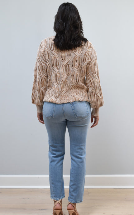 Back view of light-wash straight-leg jeans showing pocket placement and straight-leg silhouette.