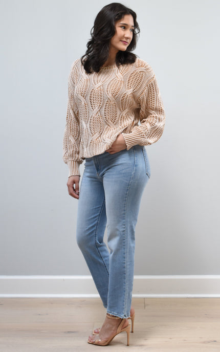 Side view of light-wash straight-leg jeans highlighting the mid-high 10.5” rise and smooth hip fit.