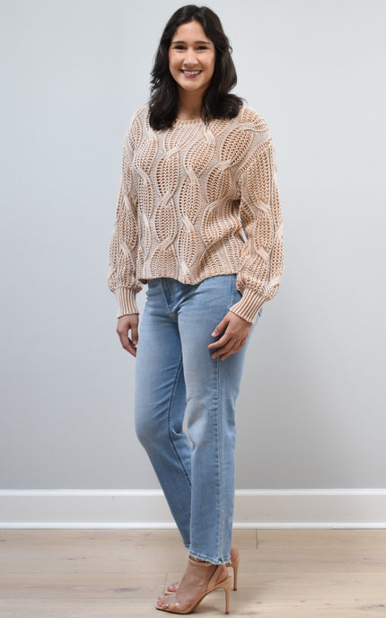 Side view of light-wash straight-leg jeans highlighting the mid-high 10.5” rise and smooth hip fit.