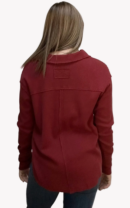 Autumn Ridge Polo long sleeve top in thermal cotton-blend fabric – split V-neckline with soft collar – front view on soft linen background – Justyna Grace Boutique