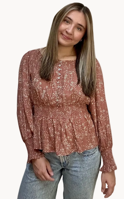 Justyna Grace Boutique Meadow Rose Smocked Peasant Top in ditsy floral print, front view on soft linen background