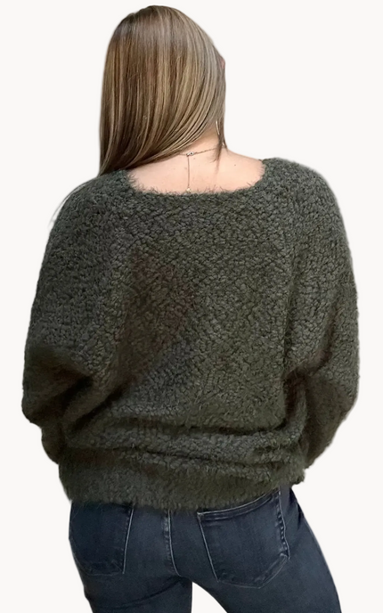 Plush popcorn-texture V-neck sweater with relaxed fit and hi-low hem – fuzzy soft knit in a gently draped silhouette – front view on soft linen background – Justyna Grace Boutique