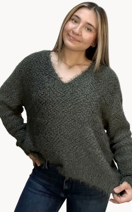 Plush popcorn-texture V-neck sweater with relaxed fit and hi-low hem – fuzzy soft knit in a gently draped silhouette – front view on soft linen background – Justyna Grace Boutique