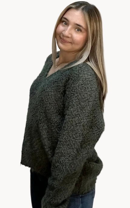 Plush popcorn-texture V-neck sweater with relaxed fit and hi-low hem – fuzzy soft knit in a gently draped silhouette – front view on soft linen background – Justyna Grace Boutique