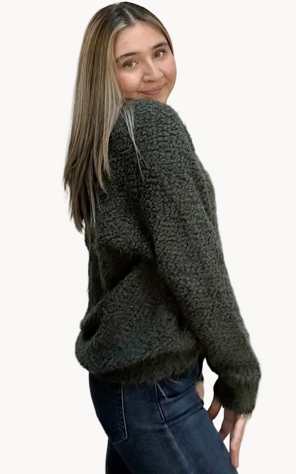 Plush popcorn-texture V-neck sweater with relaxed fit and hi-low hem – fuzzy soft knit in a gently draped silhouette – front view on soft linen background – Justyna Grace Boutique