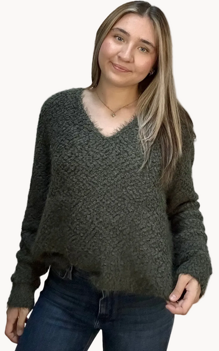 Plush popcorn-texture V-neck sweater with relaxed fit and hi-low hem – fuzzy soft knit in a gently draped silhouette – front view on soft linen background – Justyna Grace Boutique