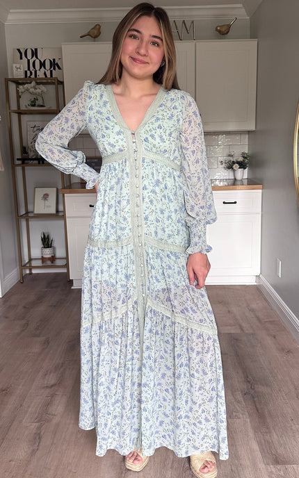Leah floral lace trim maxi dress with flowing silhouette, covered button front, and romantic floral chiffon