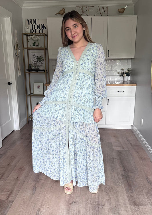 Leah floral lace trim maxi dress with flowing silhouette, covered button front, and romantic floral chiffon