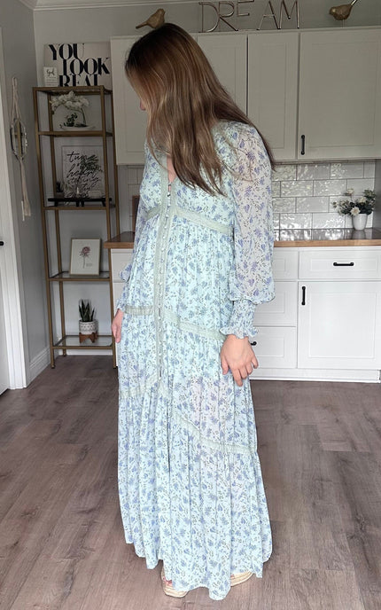 Side view of the Leah floral lace trim maxi dress showing soft drape and flowy maxi length