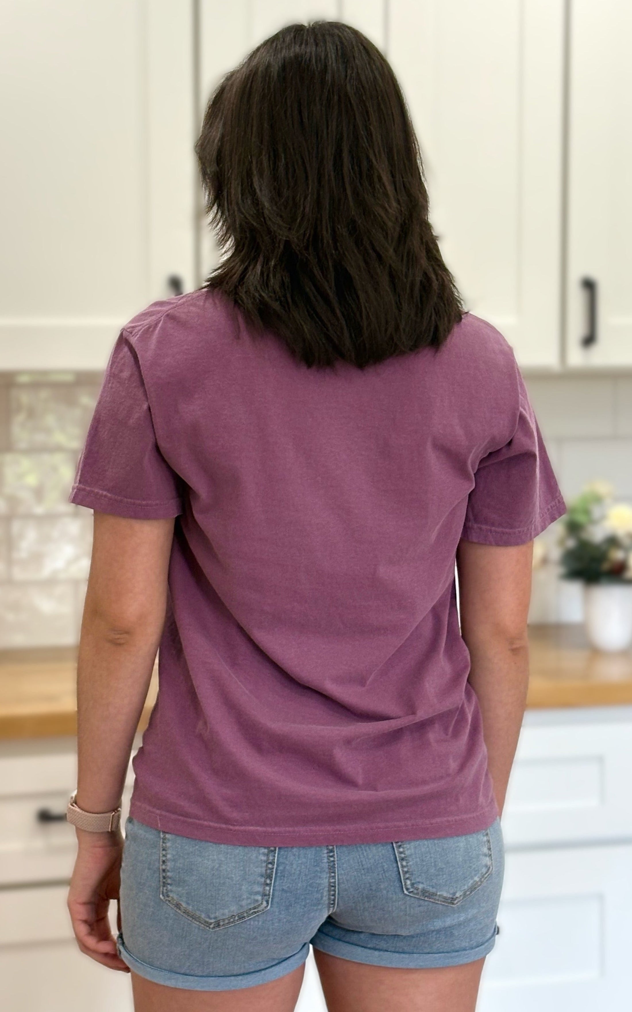 Vintage-style “Love Like Jesus” floral graphic tee with soft cotton feel and relaxed fit.