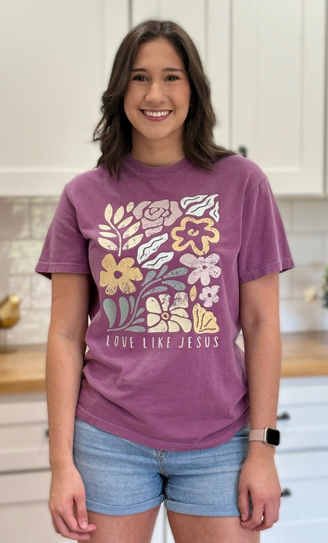 Vintage-style “Love Like Jesus” floral graphic tee with soft cotton feel and relaxed fit.
