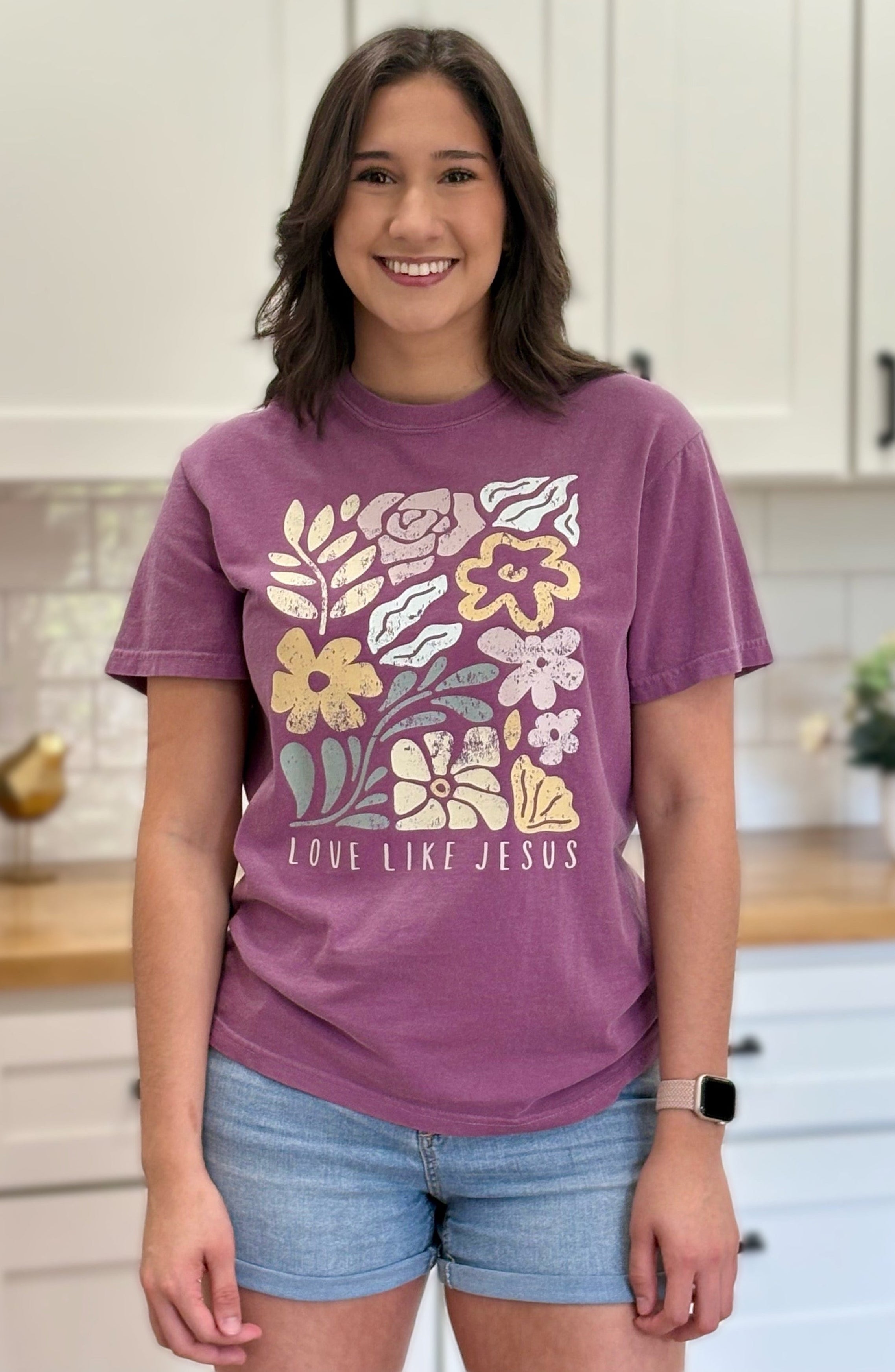 Vintage-style “Love Like Jesus” floral graphic tee with soft cotton feel and relaxed fit.