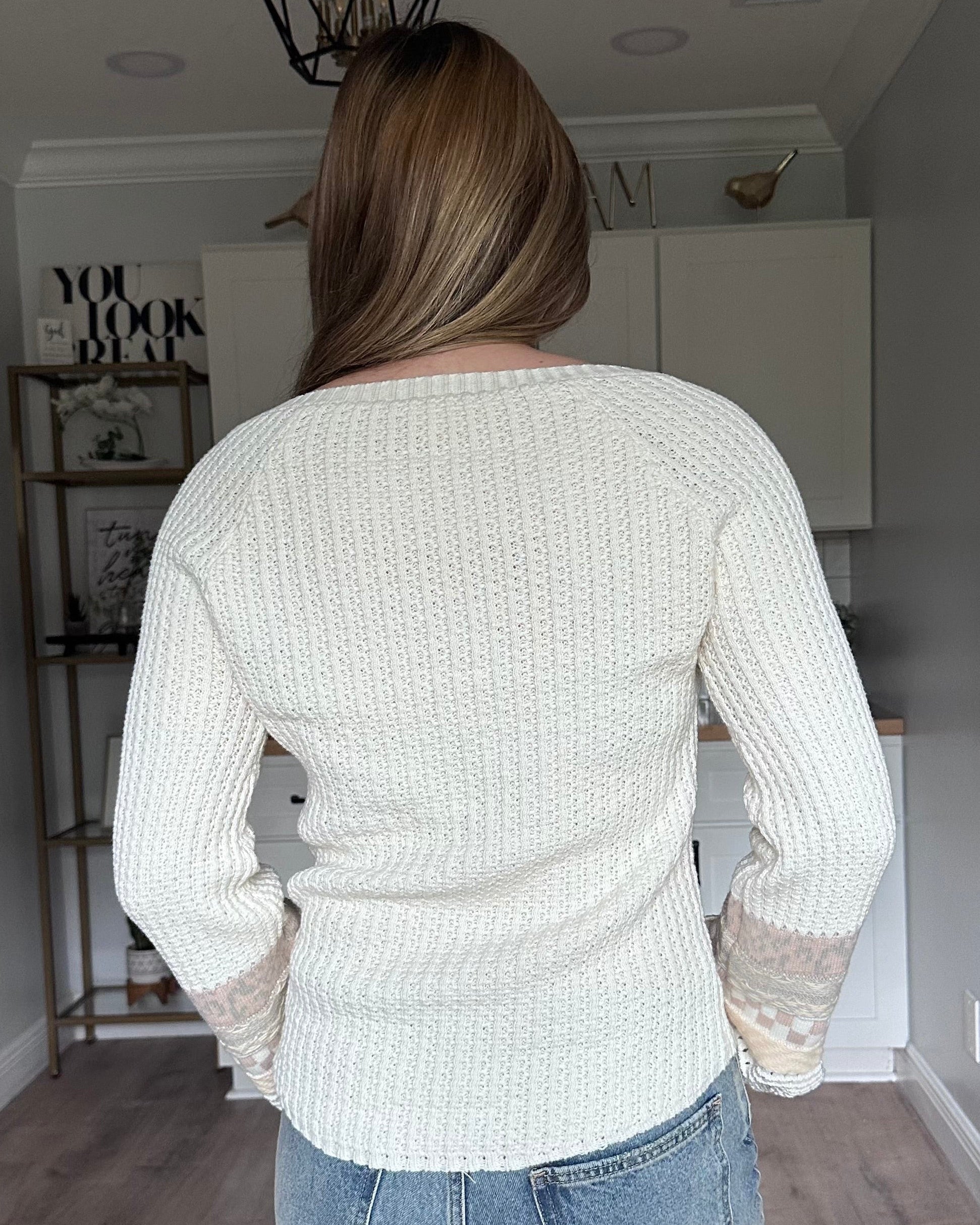 Back view of the Margot henley sweater with clean silhouette and comfortable drape