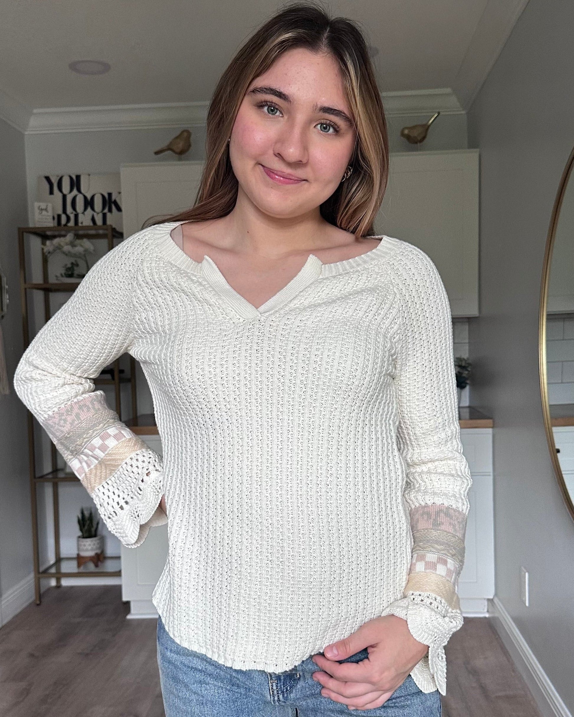 Margot mixed sleeve henley sweater with sliced V-neckline and relaxed cotton knit body