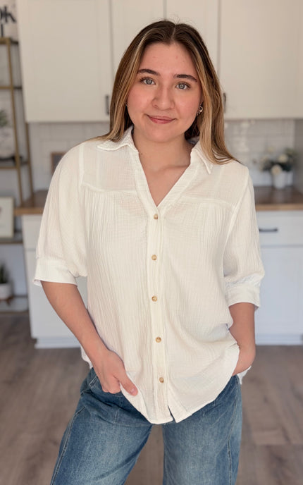 Model wearing Marin cotton gauze button down shirt with relaxed fit and half sleeves