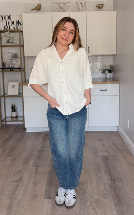 Model wearing Marin cotton gauze button down shirt with relaxed fit and half sleeves