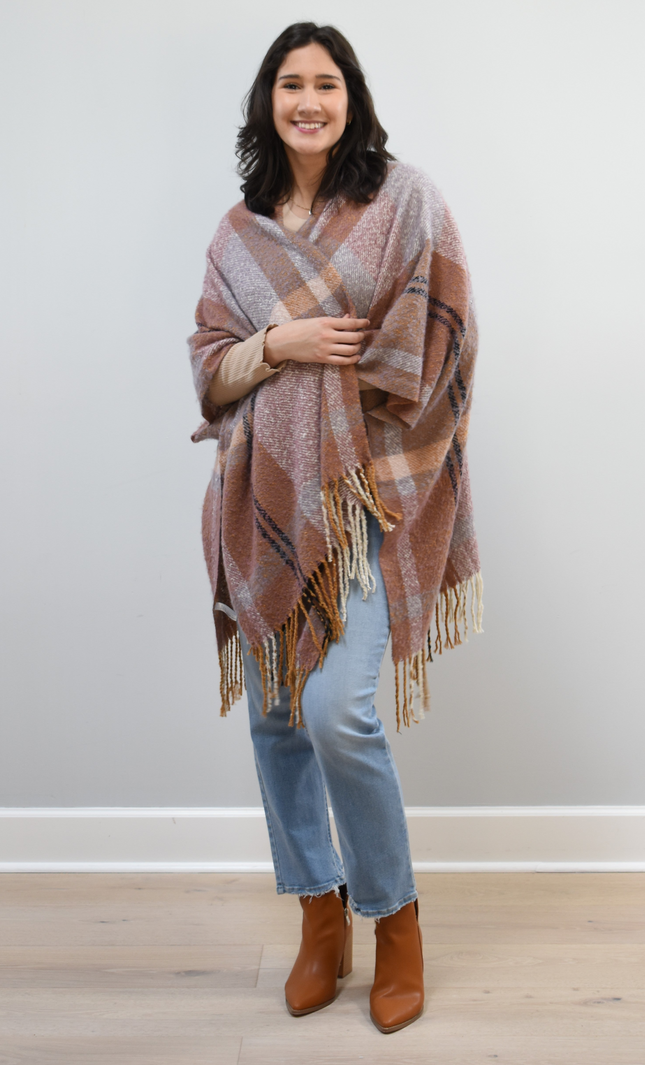 Mauve Meadow Ruana on soft linen background, featuring brushed knit texture and mauve-neutral stripes.
