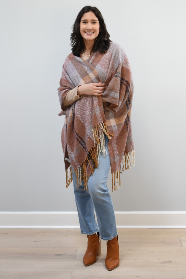 Mauve Meadow Ruana on soft linen background, featuring brushed knit texture and mauve-neutral stripes.