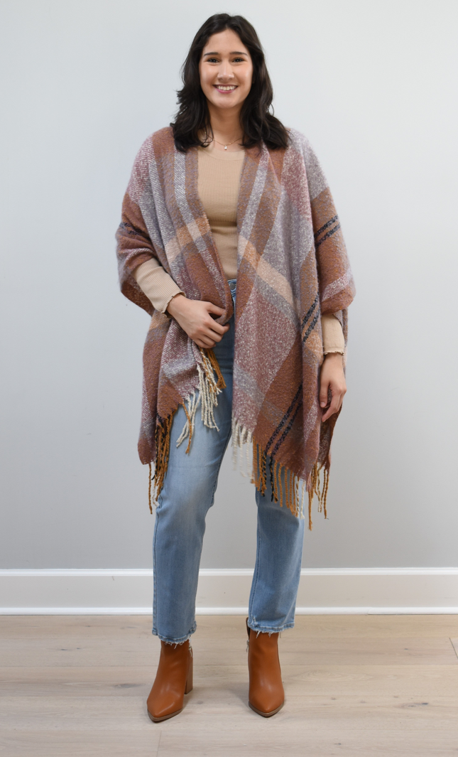 Mauve Meadow Ruana on soft linen background, featuring brushed knit texture and mauve-neutral stripes.