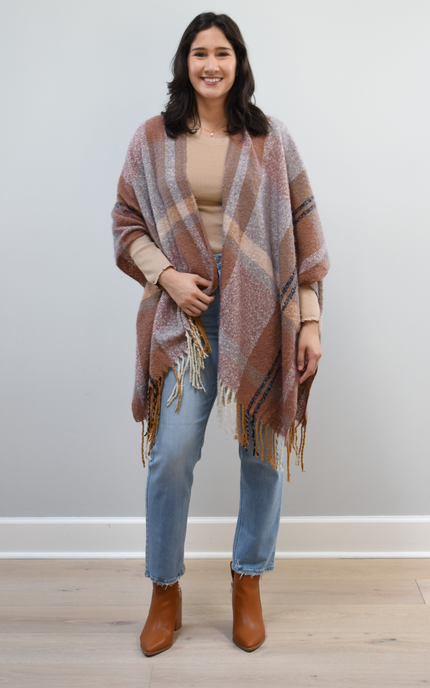 Mauve Meadow Ruana on soft linen background, featuring brushed knit texture and mauve-neutral stripes.